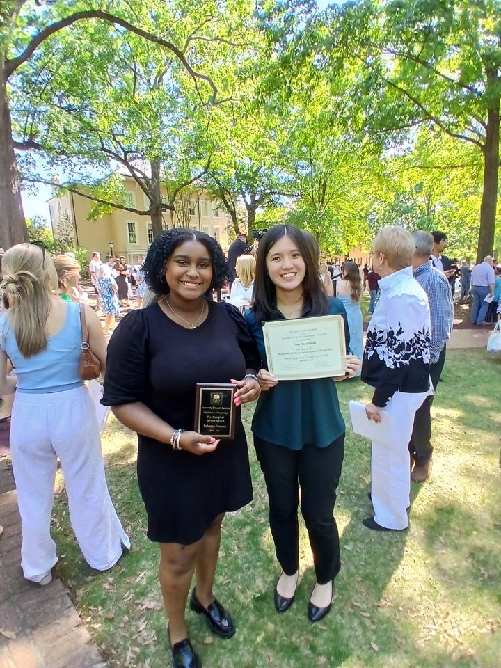 Rebecca (on left) and Tam (on right) with their awards.